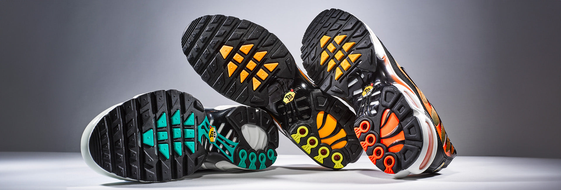 Nike Air Max Plus TN in orange, grün und rot